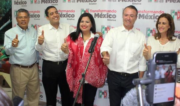 Quirino Gana Guberntura d eSinaloa 2016Tenemos la certeza, de acuerdo con tendencias electorales mostradas por siete casas encuestadoras, que el PRI ha recuperado la gubernatura de Sinaloa, afirmó en medio de una celebración la dirigente Rosa Elena Millán Bueno quien acompañó al candidato Quirino Ordaz Coppel en rueda de prensa donde, quien se perfila a ser gobernador electo, exhortó a la unidad, a trabajar en equipo y a la civilidad porque, enfatizó, “todos somos Sinaloa”.